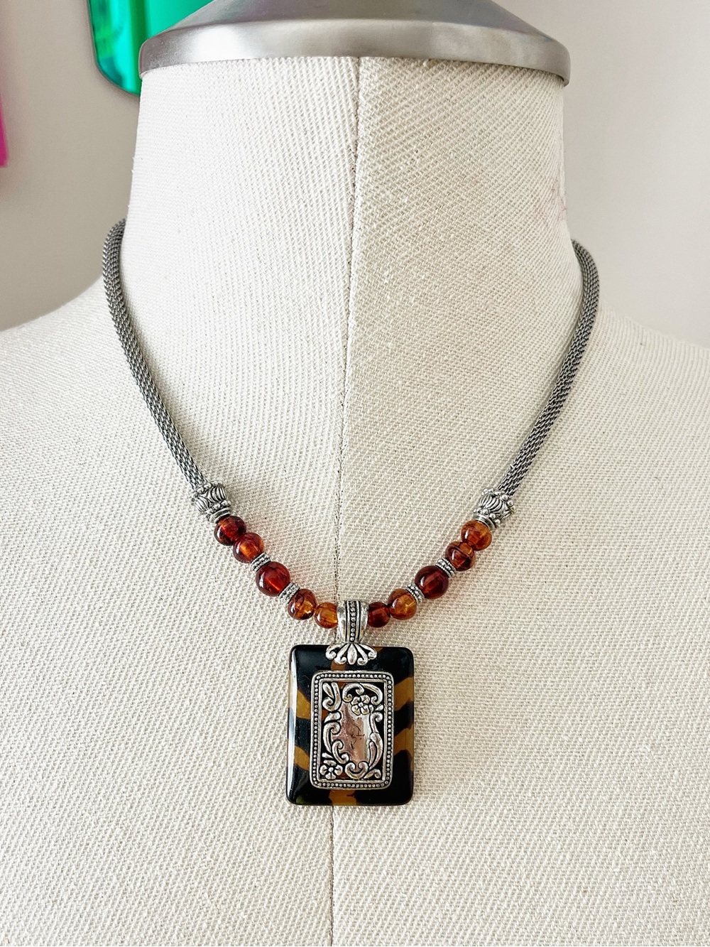Statement necklace with faux tortoise pendant